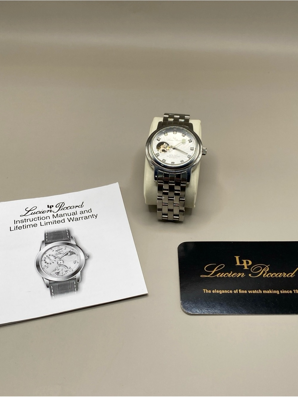 Lucien Piccard automatic stainless steel with diamond  stone very good condition